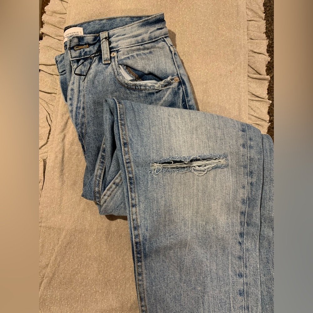 Zara high waisted, ankle length. Destroyed style, light wash jeans.